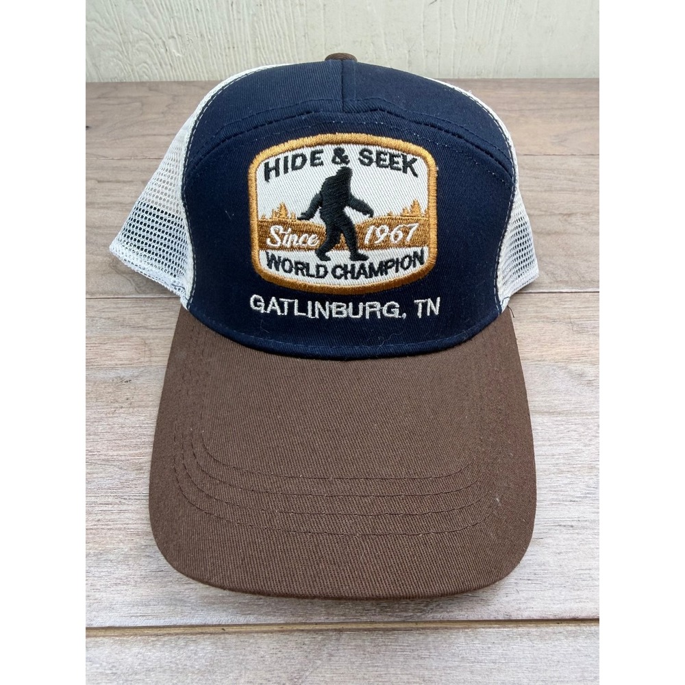 Bigfoot Hide & Seek Trucker Hat Men'sNavy Brown Cream Gatlinburg TN